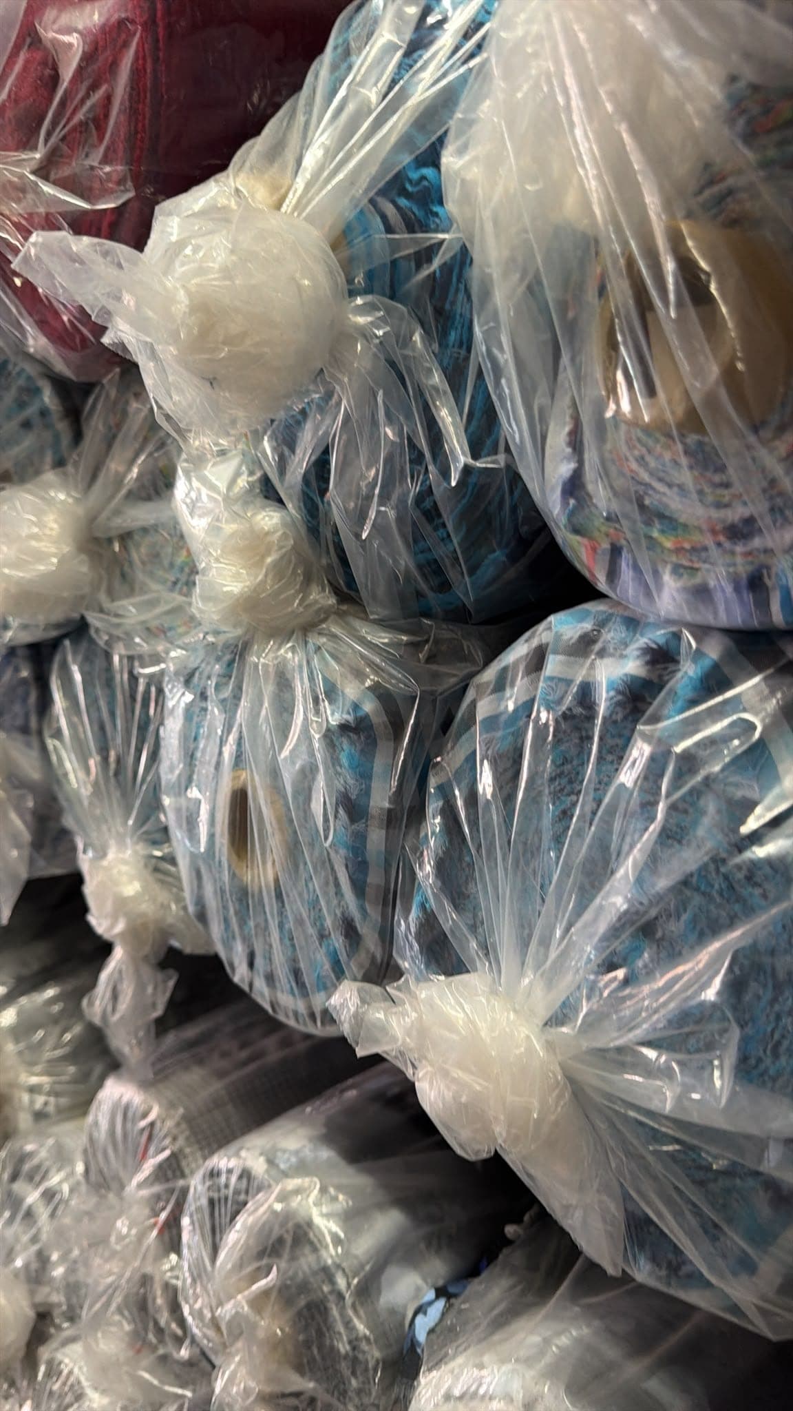 Assorted fabric rolls warehouse